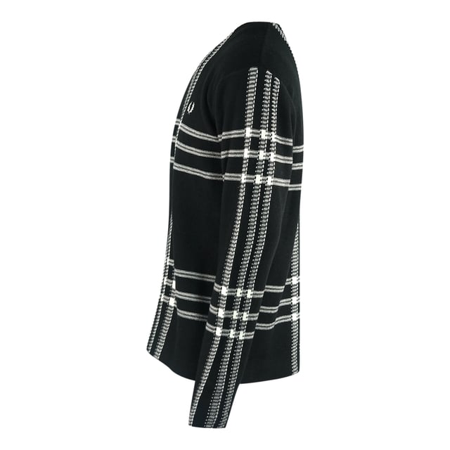 Fred Perry White Tartan Black Jumper. Stand out from the crowd with this Fred Perry Black Jumper, this jumper which is made in China shows a bold branded logo on the right chest. This pullover is trimmed with ribbed cuffs and hemline. Fred Perry jumper in black jumper perfect to wear in any season. 50% Acrylic, 50% Wool, Waist and Sleeve Endings. Round Neck, Logo On Right Chest. Regular Fit, Fits True To Size, Laurel Wreath Logo, Tartan Pattern. Style Code: K4545 102