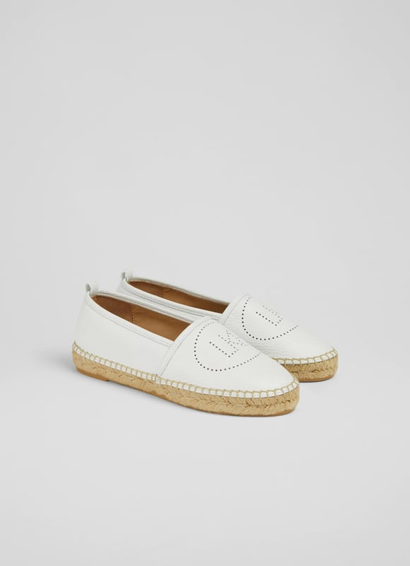 A playful take on the classic flat espadrille, Alexa is a fun everyday summer shoe. Crafted in Spain from super-soft white grainy leather, these round toe espadrilles, have pull-on back tabs, LKB perforation detail to the top of the foot and a woven espadrille sole. Wear them with cotton dresses when the sun shines.