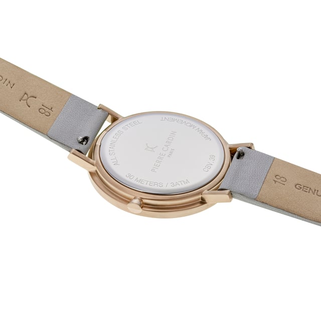 This Pierre Cardin Belleville Simplicity Analogue Watch for Women is the perfect timepiece to wear or to gift. It's Rose Gold 39 mm Round case combined with the comfortable Grey Leather watch band will ensure you enjoy this stunning timepiece without any compromise. Operated by a high quality Quartz movement and water resistant to 3 bars, your watch will keep ticking. Classic and charming  watch perfect for every occasion High quality 21 cm length and  18 mm width Grey Leather strap with a Buckle Case diameter: 39 mm,case thickness: 5.8 mm, case colour: Rose Gold and dial colour: Rose gold