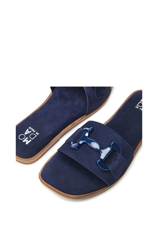 Obsess over Olayo. The perfect suede slip featuring metal trim. Pair with a summer dress or with a blazer for the perfect off-duty look.