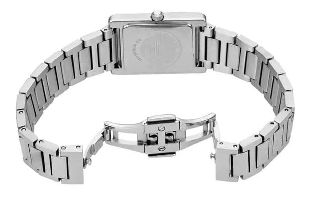This Emporio Armani Genni Analogue Watch for Women is the perfect timepiece to wear or to gift. It's Silver  Rectangular case combined with the comfortable Silver Stainless steel watch band will ensure you enjoy this stunning timepiece without any compromise. Operated by a high quality Quartz movement and water resistant to 5 bars, your watch will keep ticking.