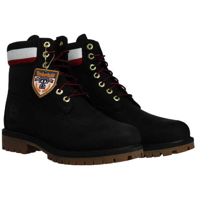 The Timberland 6-Inch Premium Heritage Men's Black Boots are a timeless and rugged choice for men who want both style and durability in their footwear. Here are the key features of these boots:

 Black Nubuck Leather:  These boots are typically crafted from premium black nubuck leather, known for its soft, velvety texture and durability. Nubuck leather offers a sleek and classic appearance.

 Classic 6-Inch Height:  These boots feature the iconic 6-inch height, providing ankle support and protection. They are versatile and suitable for various occasions, from casual outings to outdoor activities.

 Padded Collar and Tongue:  The boots come with a padded collar and tongue for added comfort, reducing the risk of chafing or discomfort during extended wear.

 Lace-Up Closure:  Typically, these boots feature a lace-up closure system with rustproof hardware, allowing you to achieve a secure and customized fit while ensuring long-lasting durability.

 Anti-Fatigue Technology:  Some Timberland boots, including the 6-Inch Premium Heritage line, come with anti-fatigue technology in the midsole. This technology provides all-day comfort and support, making them suitable for extended wear.

 Versatile Style:  These boots are designed to be versatile, making them suitable for a range of outfits and occasions, from urban adventures to outdoor pursuits.

 Timberland Branding: These boots often feature Timberland branding details, such as the iconic Timberland tree logo on the side, tongue, or heel, representing the brand's commitment to quality and style.

 Durable Rubber Outsole:  The rubber outsole offers excellent traction and grip on various surfaces, ensuring stability and safety in different environments.

In summary, the Timberland 6-Inch Premium Heritage Men's Black Boots combine style, comfort, and durability. With their premium nubuck leather construction, classic design, and cushioned support, they are a versatile addition to your wardrobe, suitable for both everyday wear and outdoor adventures. These boots represent Timberland's tradition of quality and fashion-forward designs for men's footwear.