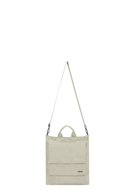 Made from our signature nylon, the Portrait Nylon Tote is the perfect way to carry all your everyday essentials. Featuring a padded carry handle and adjustable crossbody strap with a clip off function. Features: , Zip top opening, Front oversized flap over zip pocket, Rear zip pocket, SMITH & CANOVA antique brass logo, Branded antique brass zips, Padded grab handle, Adjustable crossbody strap (detachable), Internal 15 inch padded laptop sleeve, Internal zip pocket, 2 Internal mobile phone slip pockets - fits normal and plus size smart phones, 2 Internal pen slip pockets Style Ref: 92682 STONE