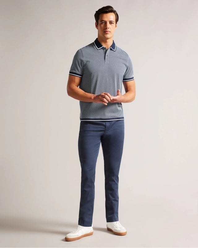 Make way for AFFRIC. With plenty of style to go around, this classic polo is just what your wardrobe needs. Pair it with chinos, jeans or tailored trousers for a multitude of looks.


Polo shirt
Geometric design
100% Cotton
Short sleeved
Classic collar
Striped trims







100% Cotton
&nbsp;
263994






&nbsp;
&nbsp;