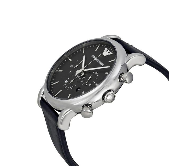 This Emporio Armani Luigi Chronograph Watch for Men is the perfect timepiece to wear or to gift. It's Silver 46 mm Round case combined with the comfortable Black Leather watch band will ensure you enjoy this stunning timepiece without any compromise. Operated by a high quality Quartz movement and water resistant to 5 bars, your watch will keep ticking. This classic chronograph watch gives a comfortable feeling with its leather strap, it's perfect for every occasion -The watch has a calendar function: Date, Stop Watch, 24-hour Display, Luminous Hands High quality 21 cm length and 21 mm width Black Leather strap with a Buckle Case diameter: 46 mm,case thickness: 12 mm, case colour: Silver and dial colour: Black