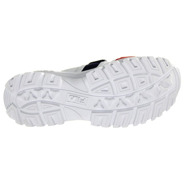 The Fila Outdoor Women's White Sliders are a stylish and comfortable choice for women looking for easy-to-wear footwear suitable for outdoor activities and casual occasions. Here are the key features of these sliders:

Key Features:

 White Synthetic Upper:  These sliders typically feature a synthetic upper in white, offering a clean and versatile appearance. The synthetic material is durable and easy to clean, making these sliders suitable for outdoor use.

 Slip-On Design:  Sliders are known for their easy slip-on design, allowing for quick and hassle-free wear. There are no laces or closures to contend with.

 Wide Single Strap:  Many Fila sliders come with a wide single strap that goes across the foot, often adorned with Fila branding or logos, adding a sporty and trendy touch to the design.

 Cushioned Footbed:  These sliders may feature a cushioned footbed that provides comfort and support for your feet, making them suitable for extended wear.

 Textile Lining:  The interior of the sliders is often lined with a soft textile material, which adds to the overall comfort.

 Durable Outsole:  The outsole is typically made from durable rubber, providing good traction and grip, whether you're wearing these sliders indoors or outdoors.

 Fila Branding:  You'll find Fila branding details on the strap, insole, or outsole, showcasing the brand's dedication to quality and style.

In summary, the Fila Outdoor Women's White Sliders combine style and comfort, making them a convenient and trendy choice for casual wear and outdoor activities. With their synthetic upper, slip-on design, and Fila's commitment to quality, they are a great addition to your footwear collection, providing an easy and stylish solution for everyday comfort and relaxation.