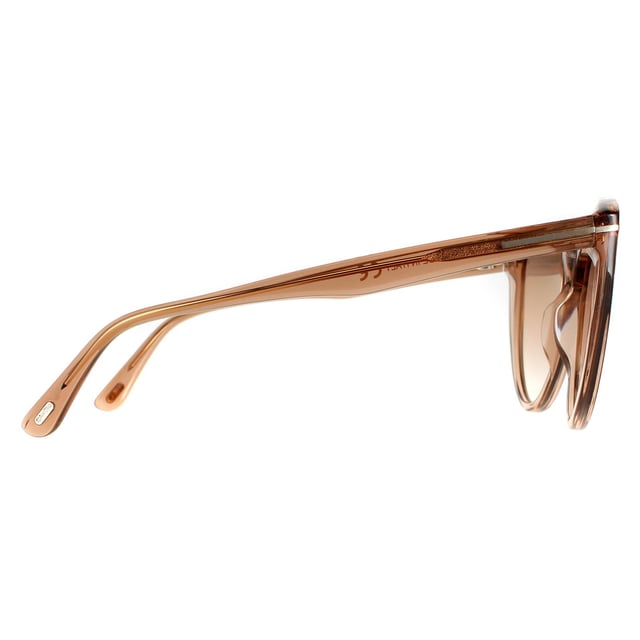 Tom Ford Cat Eye Womens Shiny Light Bruin Bruine Mirror FT0915 Isabella zonnebrillen zijn een luxueus kattenoogontwerp gemaakt van premium acetaat afgewerkt met het metalen Tom Ford T -logo op de tempels.