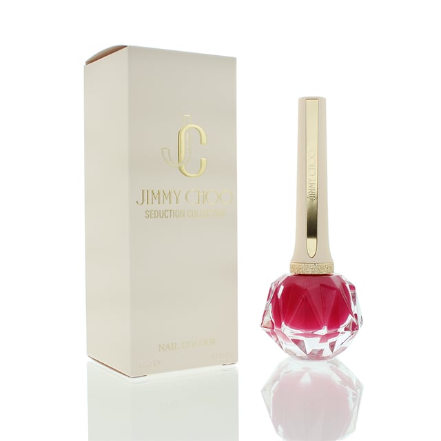 Jimmy Choo Seduction Collection Nail Polish is a luxurious and high-quality nail polish that adds a touch of glamour and sophistication to your fingertips. The formula of the Jimmy Choo Seduction Collection Nail Polish is formulated to provide a smooth and even application, without streaks or clumps. The polish glides effortlessly onto the nails, allowing for easy control and precise coverage. It dries quickly, minimising the waiting time between coats and reducing the chances of smudging or smearing. With its long-lasting formula, this nail polish offers chip-resistant wear, ensuring your manicure stays intact for days. The high-gloss finish adds a lustrous shine to your nails, creating a polished and glamorous look.