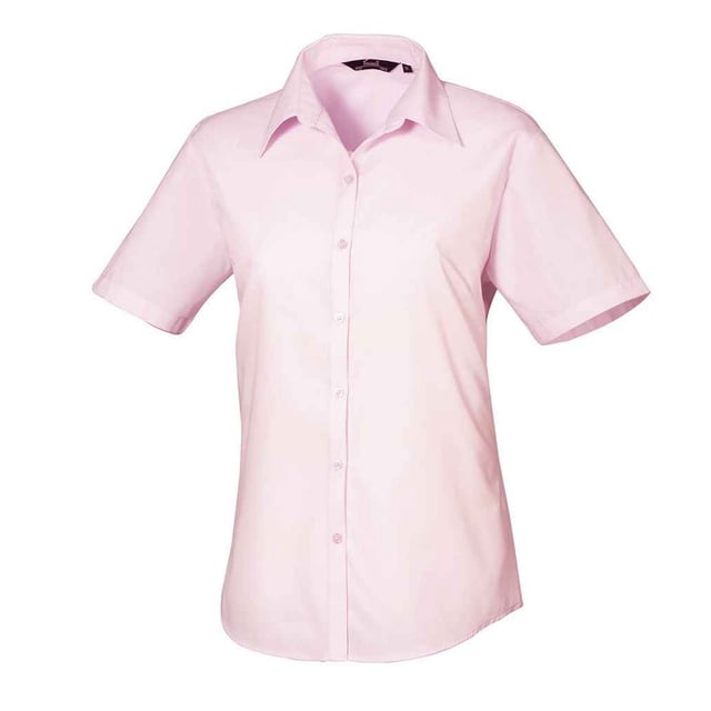 65% Polyester, 35% Baumwoll-Popelin. Gewebe: Popelin. Design: Unifarben. Knopfverschluss. Abnäher an Rücken, Brustabnäher, Doppelte Falznähte, Pflegeleicht, Perlglanz-Knöpfe. Passform: Anliegend. Nachhaltigkeit: Amfori-Freigabe, BSCI, REACH, Sedex, WRAP Zertifikat. Mit Kragen. Saum: Geschwungener Saum. Kurzärmlig.