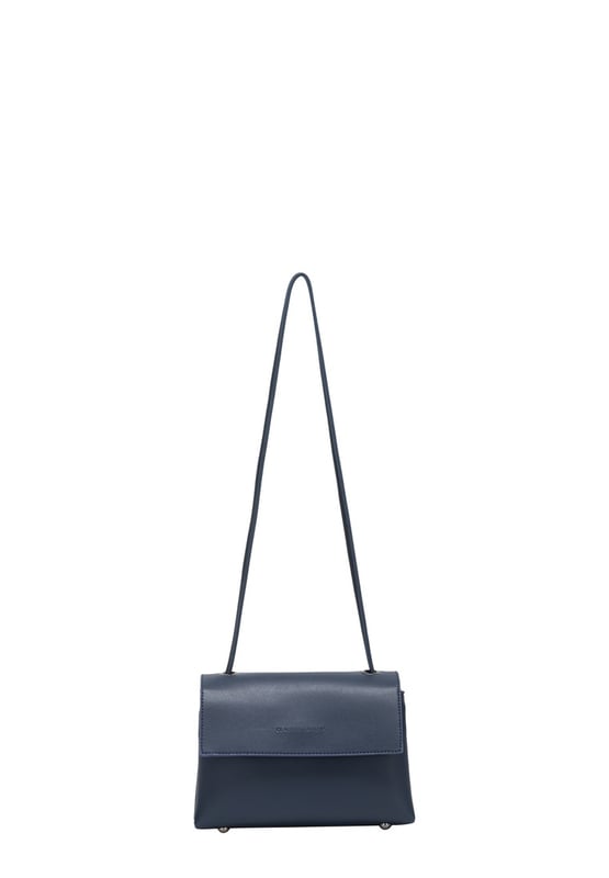 Grab this wardrobe MUST-HAVE and dress it up or go casual. The Cindi cross-body, made from unlined PU, is the perfect hands free option for ultimate style. The flap over fastening opens to reveal an added zip to keep all your essentials safe! Features: , Unlined smooth PU, Claudia Canova blind debossed logo, Flapover front with magdot fastening, Zip top opening, Two internal compartments, Gunmetal hardware, Gunmetal studded feet Style Ref: 84385 NAVY