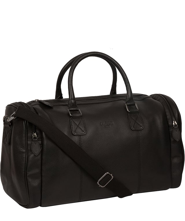 Crafted from natural leather with a supple and ultra-soft feel, the 'Ocean' holdall from Cultured London is the perfect bag for a when travel is on the agenda. The zip-over top secures the main compartment, concealing the 100% natural cotton lining. Two outer zipped pockets provide extra storage solutions, complemented by metal fittings. Comes with matching leather grab handles and an adjustable strap with a drop length of 70cm. Finished with the contemporary embossed Cultured London logo.