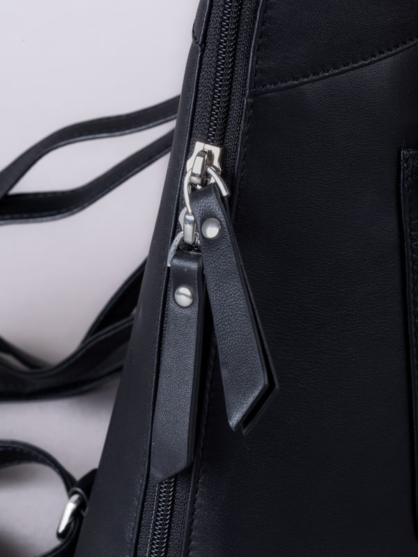 The Talkin handbag collection is a study in sleek sophistication, and this practical backpack is no exception. Crafted from soft premium leather, this classic design has plenty of space to ensure you can carry all your essentials with ease. The adjustable leather straps offer unparalleled comfort, and we've included a grab handle for convenient carrying.