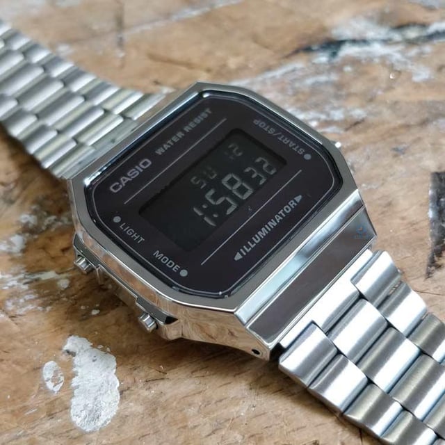 This Casio Casio Retro Digital Watch for Unisex is the perfect timepiece to wear or to gift. It's Silver  Square case combined with the comfortable Silver Stainless steel watch band will ensure you enjoy this stunning timepiece without any compromise. Operated by a high quality Quartz movement and water resistant to 3 bars, your watch will keep ticking. This is a perfect sporty and casual watch for you, it's a great gift for family or friends -The watch has a calendar function: Day-Date, Stopwatch, Alarm, Light High quality 19 cm length and 15 mm width Silver Stainless steel strap with a Fold over clasp Case diameter: 35 mm,case thickness: 9 mm, case colour: Silver and dial colour: Black