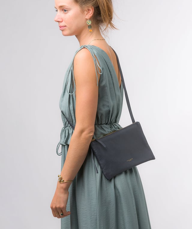 Crafted from high-quality Nappa leather, the 'Anya' cross body bag from Pure Luxuries London's Marylebone Collection is a must-have thanks to the super soft-to-the-touch feel and finish. A stylish zip-over top secures the central compartment which is lined with 100% cotton for a flawless look. Additional storage is provided by three card slots and a slip pocket, perfect for all your essentials. This accessory is adorned with a slim and adjustable strap with a maximum drop length of 65cm and complemented by eye-catching gold-coloured metal fittings and zips which give it an elegant look. The Pure Luxuries logo is embossed for an effortless and sophisticated finishing touch.