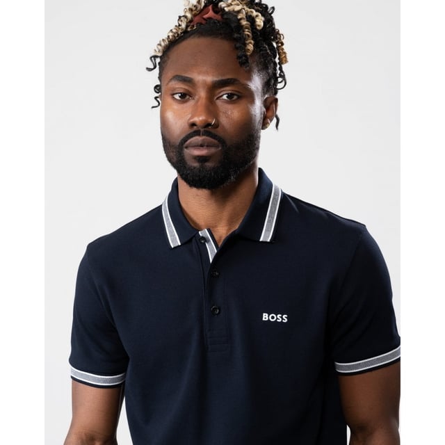A signature polo shirt by BOSS Menswear, cut to a regular fit. Featuring contrast tipping and a logo at the left chest, this short-sleeved polo shirt is designed in cotton piqué and detailed with further BOSS branding at the undercollar.
Regular fit. Flat-knit collar. Number of buttons: 3. Short sleeves. Flat-knit cuffs. Standard length.
100% Cotton
50469055
Model is 5"8 and wears size M