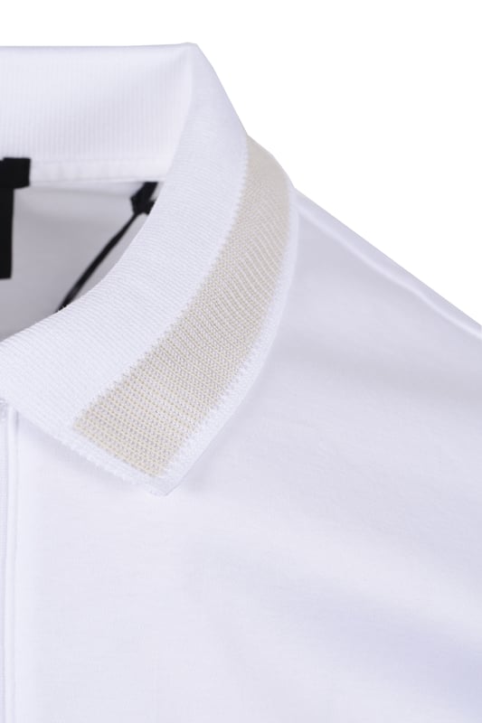 Boss H-Phillipson 199 Polo Shirt in White
Elevate your casual wardrobe with the timeless elegance of the Boss H-Phillipson 199 Polo Shirt. Crafted from premium mercerized cotton for exceptional softness and a luxurious feel, this polo shirt exudes understated sophistication.
 
Features

Slim Fit: Tailored for a contemporary and flattering silhouette.
Mercerised Cotton: Offers superior softness, lustre, and durability.
Two-Button Placket: Features elegant pearlescent buttons for a refined touch.
Ribbed Polo Collar: With single-bed detail in grey for a touch of contrast.
Ribbed Cuffs: Ensure a comfortable and secure fit.
Signature BOSS Logo: Woven pinch tag on the lower left side seam.
Side Vents: Allow for ease of movement and a comfortable fit.
Woven Reinforcement Tabs: On the interior side vents in signature BOSS colours.
100% Cotton: Guarantees breathability and comfort.