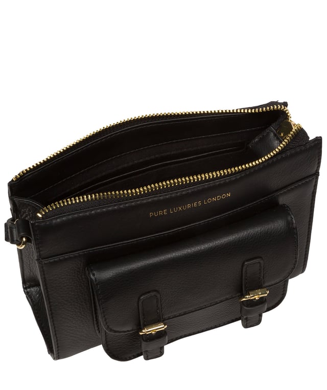 Handcrafted from Nappa leather, the 'Monica' cross body bag from the Pure Luxuries London Marylebone Collection elevates this classic design. A spacious main compartment is secured under a zip-over top which is lined with 100% cotton for a luxurious feel. Two slip pockets on the interior of the bag provide additional storage space - ideal for maintaining an organised accessory. Complementing the interior storage is a stylish pocket secured with a press-stud fastener made to look like a buckle reminscent of the classic satchel design. Gold-coloured metal fittings and zips adorn the bag alongside the slim and adjustable leather strap with a maximum drop length of 65cm. The Pure Luxuries logo is embossed in gold foil for a beautifully simple finishing touch.