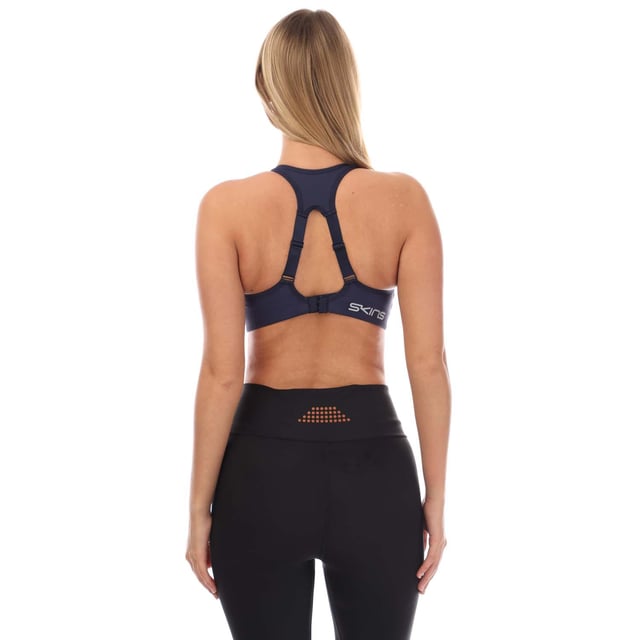 Our high impact solution for comfort and compressive support - whatever your workout. An intelligent strap design provides stability and freedom of movement with figure-flattering lines—the perfect companion to SKINS SERIES-3 Activewear Tank and Short Sleeve Tops.