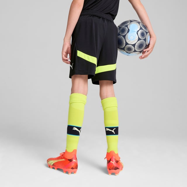 PRODUCT STORY : Hit the pitch like Manchester City's finest in these football shorts. They're made from sweat-wicking material to keep you cool in the tensest moments of the game and are finished with the team's famous crest on the leg. FEATURES & BENEFITS :  dryCELL: Performance technology designed to wick moisture from the body and keep you free of sweat during exercise. As part of the RE:FIBRE program, this garment is made of at least 95% recycled material from textile waste and other used materials.  DETAILS :  Regular fit. 170 gsm, Jacquard. Medium rise. Official team branding. PUMA branding details. PUMA Youth: Recommended for older kids between 8 and 16 years.  Our model is 150 cm tall and is wearing size  152 RUS.