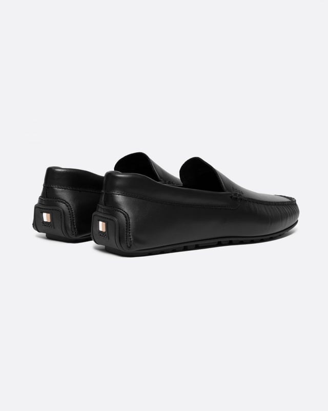 Easy-wear moccasins in nappa leather with a TPU driver outsole featuring signature details by BOSS.
Fastening top: Slip-onFully linedPackaging: Box
90% Polyamid, 10% Polyurethane, Sole: 100% Thermoplastic polyurethane, Upper material: 100% Cow skin, Innersole: 90% Polyamid, 10% Polyurethane
 
50517134
 