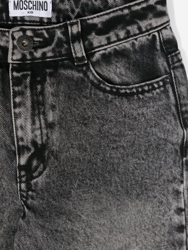Italian fashion House Moschino depict energy and precision into their fun-filled abstracts. These old black regular jeans are engineered in beautiful high quality. With a traditional five-pocket design, they showcase vibrant logo embroidered lettering and belt loops. Front Zip Closure With Button Fabric: 100% Cotton