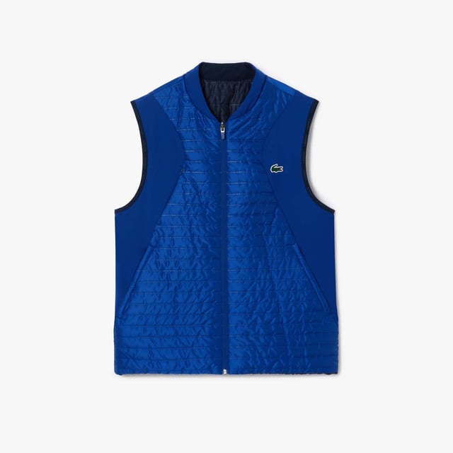 Designed for Tennis & Golf  for a regular frequency of use. This reversible padded sleeveless jacket is made with bonded quilting mixed with stretch taffetas on one side for an athletic silhouette and full bonded quilting for a more elegant look. This 3rd layer will keep you warm during your outdoor training. This product is providing you water repellent fabric which guarantees you to remain dry in bad weather conditions. Regular fit: natural ease on body It has been tested by professionals players to ensure functionality. The most adapted fashion sport apparel and accessories items to our Golf and Tennis athletes to prepare for and for game day.