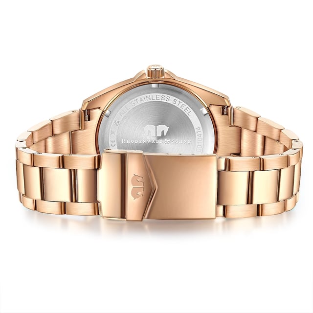 If you love women's watches with a timeless design in connection with your own character and excellent quality, this model of the Rhodenwald & Sons brand is the perfect choice. The watch manufacturer stands for stylish and sustainable masterpieces for all generations: the timepiece inspires watch lovers with a tidy dial, subtle line indices, Arabic numbers, minute and luminiscant staff. The robust stainless steel housing and a suitable limb strap - both made of rose gold -shaped stainless steel - form a feminine contrast to the dark dial. A precise quartz clock, a screwed housing floor and waterproof up to 10 ATM complete the exclusive equipment concept.