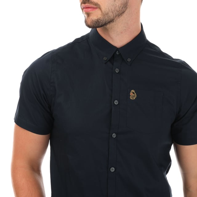 Mens Luke 1977 Iron Bridge Short Sleeve Shirt in navy.- Button down collar.- Short sleeves.- Chest pocket.- Button fastening.- Embroidered branding.- Shaped hem.- 98% Cotton  2% Elastane.  - Ref: M590802NAVY