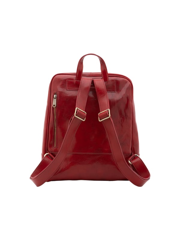 Bolso bandolera para mujer. El cierre es con cremallera. Los bolsillos internos son uno con cremallera. Los bolsillos externos son uno frontal con cremallera y otro trasero con cremallera. La bandolera es ajustable en piel. El mango es de piel. Hay un compartimento interno. El material exterior es auténtica piel de vacuno. Internamente está forrado en algodón. Medidas: 30x36x12 cm. Hecho en Italia