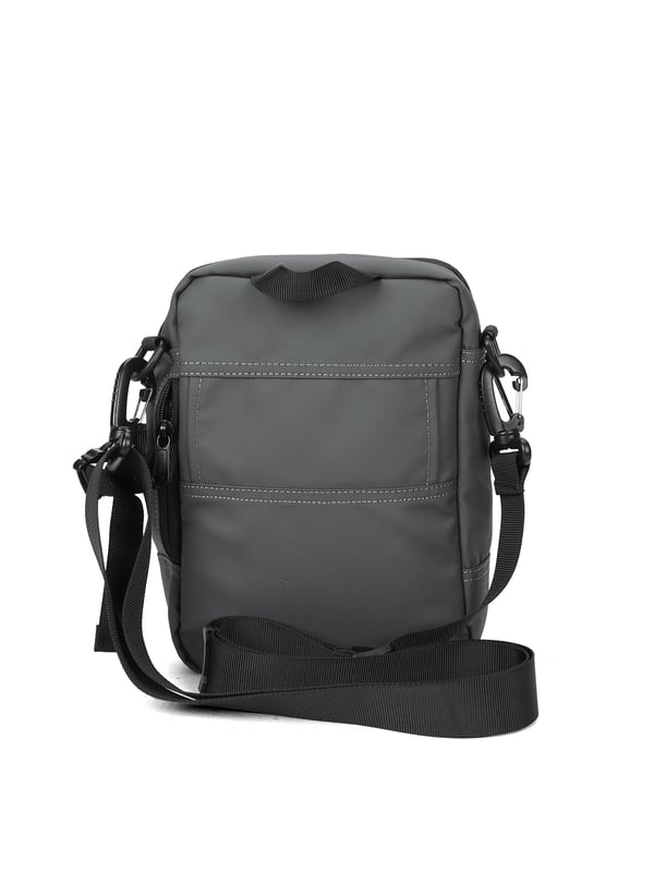 unisex schoudertas met ritssluiting. twee open binnenzakken. één voorkant met externe zakken met ritssluiting. verstelbaar en afneembaar in stoffen schouderband. in stoffen handvat. binnenste compartimenten. SchoudertasUnisex extern materiaal gevoerd met polyester binnenkant. Afmetingen: 16x8x23 cm. Modeproduct