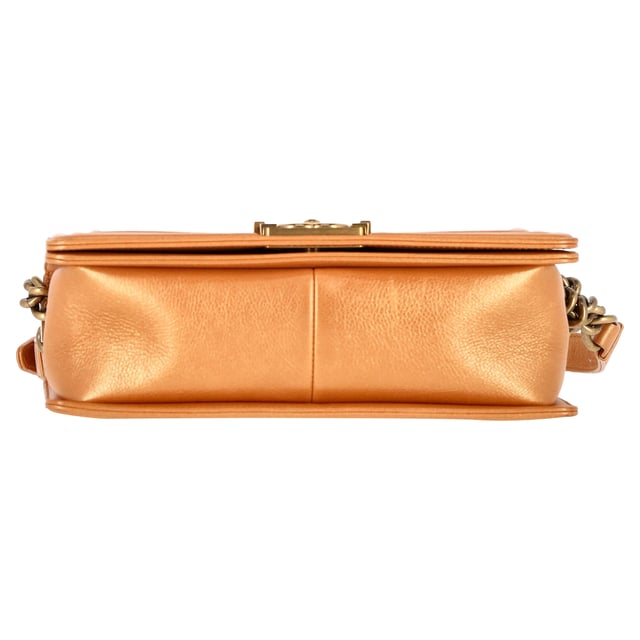 VINTAGE, RRP AS NEW
Elevate your ensemble with the timeless allure of the Chanel Quilted Medium Boy Flap Bag in sumptuous brown lambskin leather. This chic shoulder bag epitomizes luxury with its diamond-quilted pattern and opulent feel. The bag showcases an aged gold chain link shoulder strap adorned with a leather shoulder pad, providing both comfort and style. The focal point is the aged gold Boy Chanel CC press lock that adds a touch of glamour. Opening the front flap reveals a matching fabric interior that includes a convenient patch pocket for organization. Perfect for adding a touch of refinement to any outfit, this Chanel bag is an iconic piece that exudes sophistication and elegance in every detail.

with Dust bag

Chanel Quilted Medium Boy Flap Bag in Brown Lambskin Leather
Condition: Excellent
Signs of wear: No retail tag, No visible sign of wear., 
Packaging: Dust bag
Color: Brown | ochre
Material: Leather | Lambskin leather
Size: One Size
Measurements: Width: 80; Height: 150; Length: 260; Handle drop: 250; Strap length: 600
SKU: NAPPUGBBA385936W