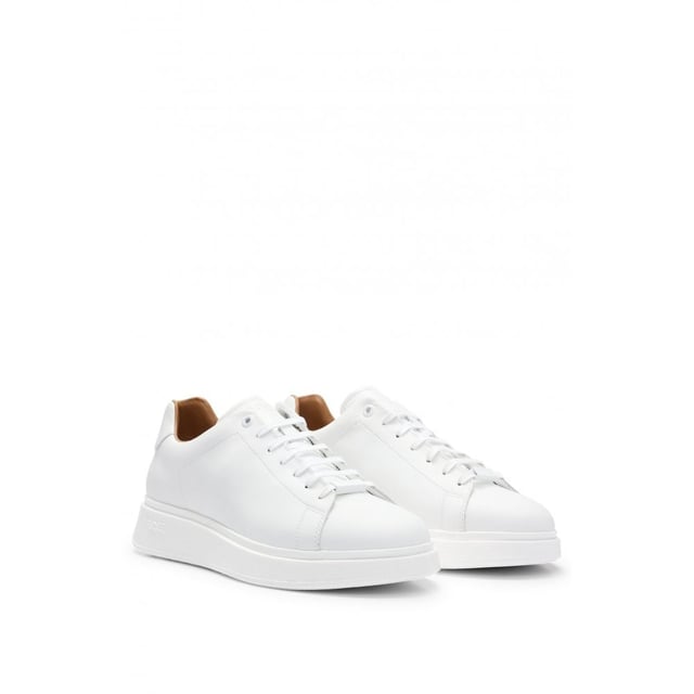 Polished-leather trainers by BOSS, made in Portugal and featuring a lace-up closure and branded rubber sole.
LacesFully linedPackaging: Box
100% Cow skin, 100% Polyester, Sole: 100% Rubber, Upper material: 100% Cow skin, Innersole: 100% Goat leather
&nbsp;
50497887
&nbsp;
&nbsp;