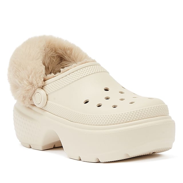 Experience unmatched comfort with these clogs, boasting excessively chunky soles that give you a 5.5cm / 2.1-inch heel height for added style. Their lightweight construction ensures all-day wearability, and the fully lined interior keeps your feet cosy. Plus, the fuzz-wrapped pivotable backstrap enhances both the look and feel of these exceptional clogs. Jibbitz™ holes makes it easy to personalise.