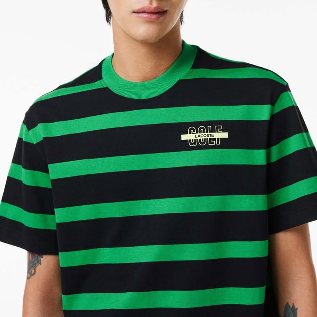 Men's Lacoste Striped 3D Print Cotton T-Shirt.- Relaxed fit, comfortable ease on body with lower shoulders.- Cotton jersey.- Golf print 3D at chest.- Embroidered crocodile at under middle back collar.- Shell: Cotton (100%).- Collar: Cotton (95%), Elastane (5%). Machine washable. Ref: TH1488PIQ.