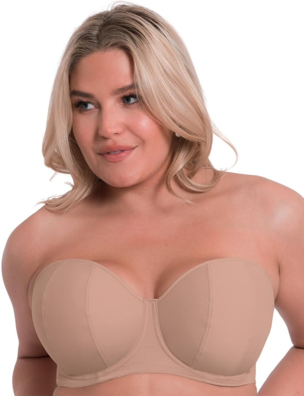 Introducing the Curvy Kate Luxe-Updated strapless bra! As a bestseller, we've updated and perfected this go-to. With its beautiful balcony shape and padding to enhance your bust, you'll look fabulous any time of day. And don't worry - it's secure with its vertical flat seamed cups and supportive inner side sling, plus a silicone grip on the band to keep it firmly in place. It fastens with a hook and eye closure and the multi-way adjustable strap gives you control over how it fits. The plain opaque fabric is perfect for everyday classic wear that you can rely on. Look no further than this must-have for comfortable support that looks great!

Bestseller has had a makeover
Must-have especially for bigger busts
Flattering balcony shape
Padding enhances your bust
Vertical flat seamed cups that ensure a secure fit
Supportive inner side sling
Silicone grip at the band to keep it in place
Underwired
Hook and eye closure
Multi-way adjustable straps
Plain opaque fabric for daily and classic wear
Country of origin: China&nbsp;
Composition: Main: 84% Nylon | 16% Elastane
Composition: Lining: 100% Nylon
Composition: Lining 2: 100% Polyester
Composition: Wing Mesh: 77% Nylon | 23% Elastane | Excluding trims
Listed in UK sizes