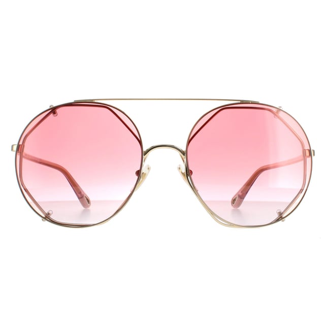 Las gafas de sol Chloe Round Womens Gold Red Gradient Ch0041S son unas elegantes gafas redondas con una escultural montura con forma de cable, barra superior para las cejas y patillas grabadas con el logotipo de Chloe para mayor autenticidad.