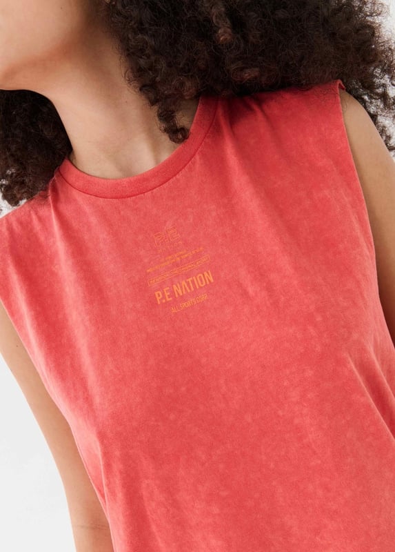 Relaxed fit, lightweight feel tank. Raw cut armholes. P.E Nation graphic on the front