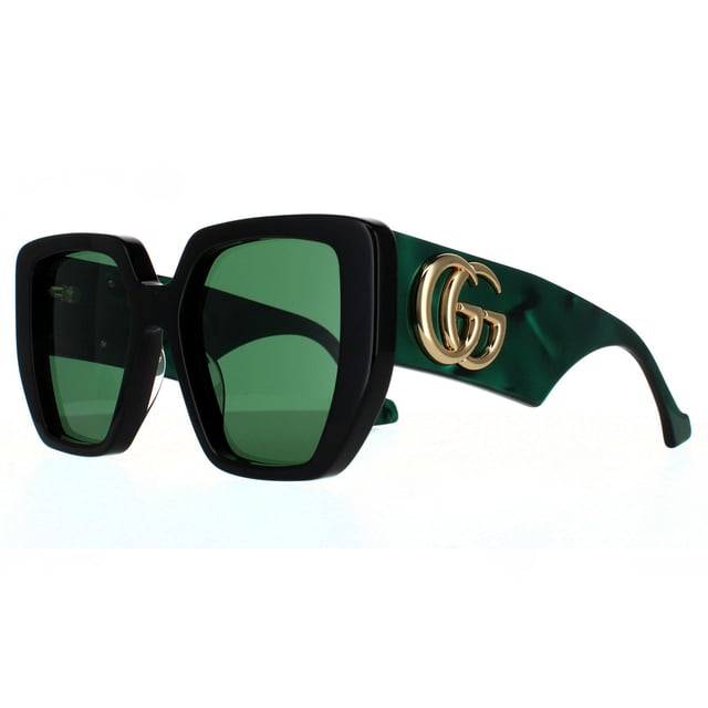 Gafas de sol Gucci cuadradas para mujer en negro y verde con espirales. Gucci presenta un marco de acetato súper grueso con patillas anchas y un logotipo GG metálico entrelazado extra grande.