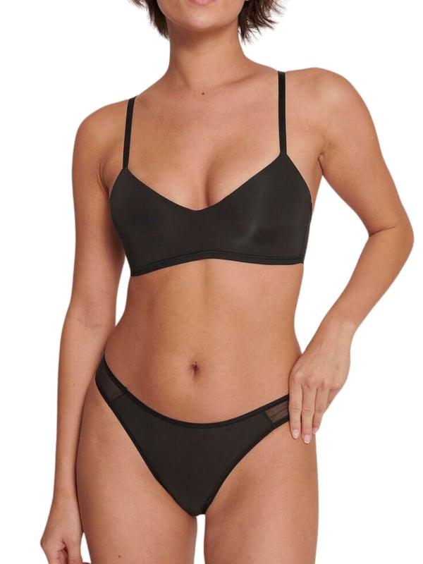 Sloggi Soft ADAPT Tiny Tanga Briefs. Tanga style briefs with super-soft microfibre fabric and sheer mesh panel detailing. This product is recommended as hand wash only.