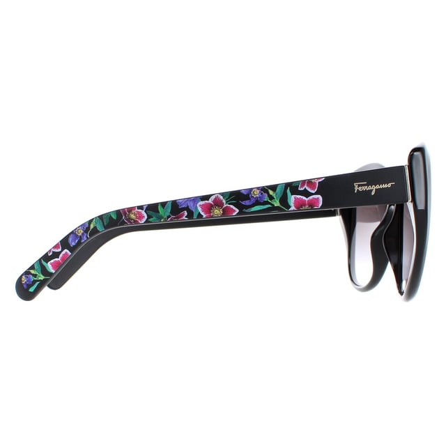 Salvatore Ferragamo Sunglasses SF912S 001 Black with Flower Print Grey Gradient are a stylish and sophisticated choice for any fashion-conscious individual. These shades feature a sleek and modern design, with a full-rimmed cat eye frame made from durable and high-quality acetate. The iconic Ferragamo logo is prominently displayed on the temples, adding a touch of luxury and designer appeal. These sunglasses are the perfect accessory for any outfit, whether you're dressing up for a special occasion or just running errands on a sunny day.