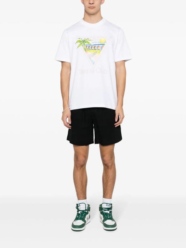 Casablanca's graphics often depict a fantastical world of sporty utopian scenes – the illustrative print on this organic cotton T-shirt portrays a Mexican-inspired landscape with a tennis court in the middle.