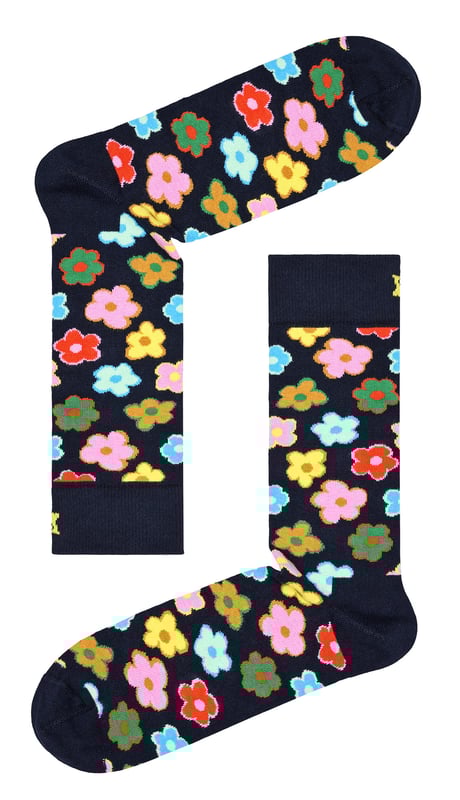 Happy Socks - Men’s & Ladies Novelty Flower SocksThinking about getting those feet looking groovy? These Novelty Socks with Funky Flower patterns by Happy Socks are a great pair for anyone who wants to jazz up their feet with a bit of flower power!They feature a 60’s style flower pattern on each sock, making them the perfect accessory for any outfit and will keep you feeling comfy all day long. Made with 86% combed cotton guaranteeing maximum comfort and softness. These Flower socks would make a perfect last minute gift for anyone.They're also reinforced at the heel and toe for extra durability, so they'll last even longer than you would expect from such a fun pair of socks. The black socks with colourful flower patterns are sure to brighten up any day!Happy Socks are a popular brand providing a high-quality sock that combines unique designs and craftsmanship. Mikael Söderlindh and Viktor Tell had a vision to spread happiness by turning an everyday essential into a colourful design piece.Today, Happy Socks has reached 90 countries and every continent. With Concept Stores all around the world, from LA to Tokyo, Happy Socks can be found in over 10,000 top fashion apparel boutiques.These socks are made from 86% Cotton, 12% Polyamide, 2% Elastane and come in 2 sizes: Men’s 6-11 UK & Ladies 4-7 UK. They come in Black with multicoloured flower patterns and they are Machine Washable.Extra Product DetailsHappy Socks Adult Novelty SocksSoft Combed Cotton1 Pair Per PackReinforced Heel & ToeFunky Colourful Flower PatternsA Perfect Gift IdeaSoft & ComfortableHappy Socks Branded2 Size OptionsMachine Washable