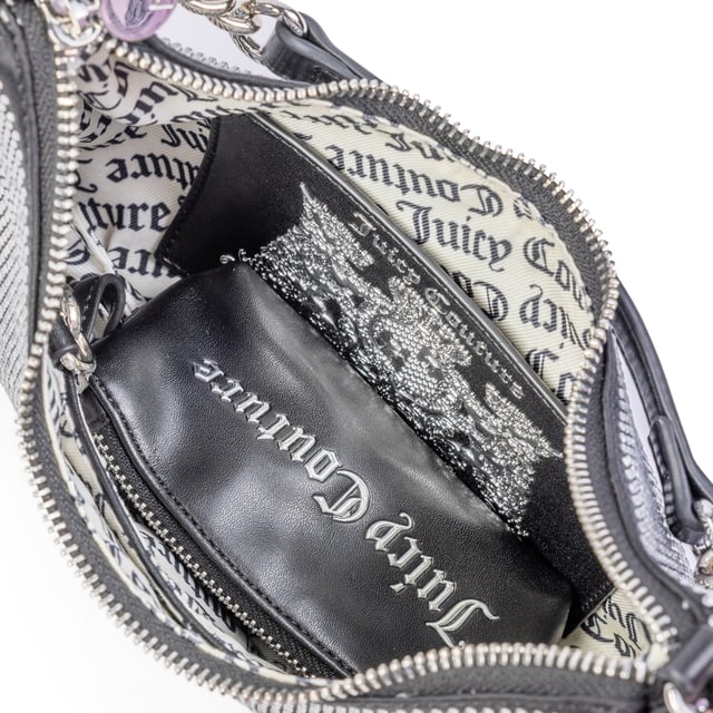 Minibolso de lentejuelas Juicy Couture - Rock y glamour para tus salidas nocturnas
Deléitate con la reluciente elegancia del mini bolso bandolera de lentejuelas Juicy Couture. Perfecto para ocasiones especiales, este accesorio combina estilo rock y glamour, añadiendo un toque de brillo a cualquier look. Con una correa de cadena plateada y adornado con el icónico logo de lentejuelas, es el aliado perfecto para brillar en cualquier evento.
Dimensiones: A24,5 x A7 x P16 cm