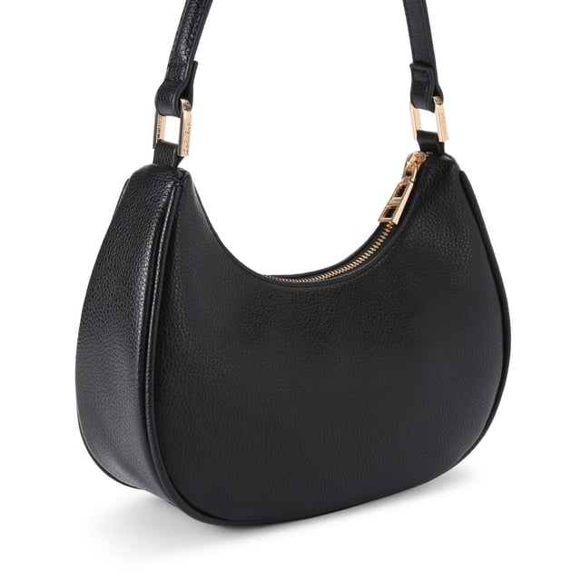 This Carvela Scoop Shoulder Bag features a black exterior with gold branding on the front. Dimensions: 20.5cm (H), 25cm (L), 7cm (D). Strap length cross body: 107cm.