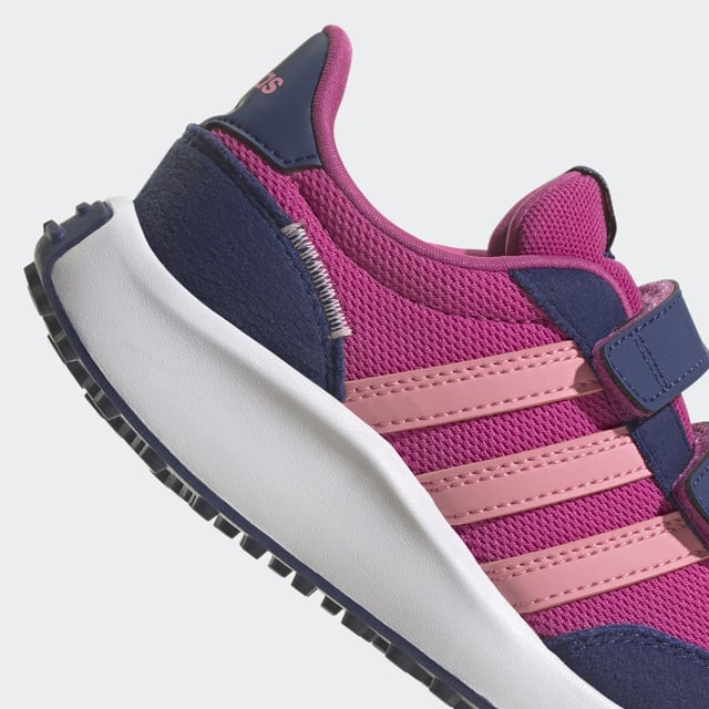 Bring your child a touch of the old school. These kids' adidas sneakers are inspired by '70s running shoes and have two hook-and-loop straps to ensure those feet stay in place. The Cloudfoam midsole is soft and cushiony to keep them comfortable throughout the day. Suede overlays on the toe and heel add a touch of nostalgia and texture to the look. Made with a series of recycled materials, and at least 50% recycled content, this product represents just one of adidas' solutions to help end plastic waste.  - Regular fit - Hook-and-loop closure - Closed mesh upper - Textile lining - Toe and heel protective overlays - Cloudfoam midsole - Rubber outsole - Upper contains a minimum of 50% recycled content  Shipped by adidas