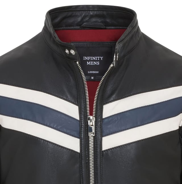 This men's café racer biker jacket, crafted from luxurious lamb soft nappa leather, is the perfect blend of retro style and modern functionality. It features bold white and navy blue stripes for a striking look, paired with durable craftsmanship for lasting wear. Designed for convenience and practicality, the jacket includes two external zipped pockets, two inner pockets, a secure collar button, and a smooth front zip closure. Whether for casual outings or motorcycle adventures, this jacket is a timeless essential for your wardrobe.

Made from premium lamb soft nappa leather for durability and comfort.
Bold white and navy blue stripes add a vintage-inspired flair.
Two external zipped pockets and two inner pockets for ample storage.
Stand collar with button closure for a secure, stylish fit.
Durable front zip closure for easy wear.
Perfect for casual wear or motorcycle enthusiasts.