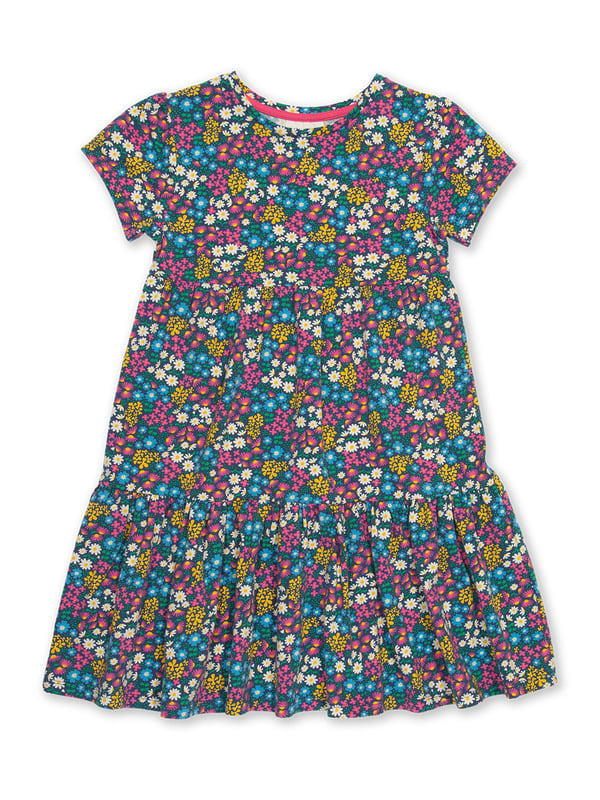 95% organic cotton 5% elastane | Proud to be certified to the Global Organic Textile Standard (GOTS) | Flower patch all-over print | Single jersey with a little bit of stretch (180-190 gsm) | Tiered style | Coconut button shoulder opening (up to and including size 3 years) | Short sleeved | Round neck | Made in Turkey | Machine washable at 40 degrees, or at 30 degrees to be kinder to the planet