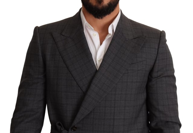 Brand: Dolce & Gabbana
  Model: MARTINI
  Style: Double breasted one button
  Fitting: Slim fit
  Color: Gray check
  Three outside pockets and two inside pockets
  One open vent in the back
  Logo details
  Made in Italy
  Material: 99% Wool 1% Elastane
  Lining: 100% Silk
Material: 99% Wool 1% Elastane