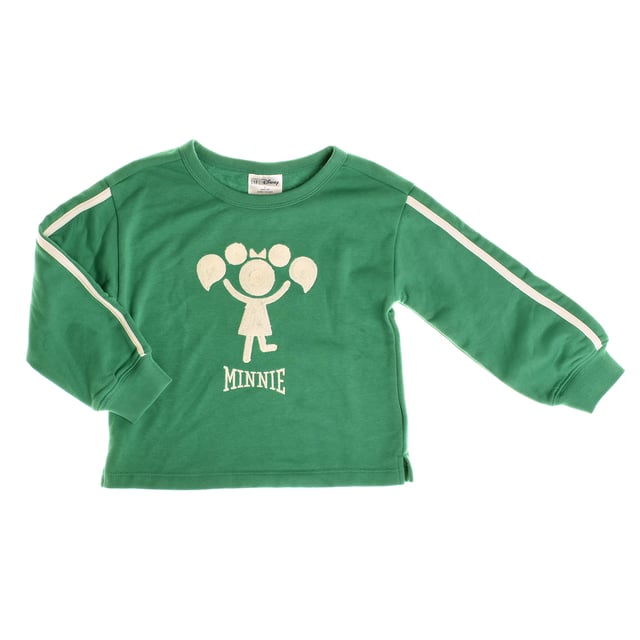 Minnie-inspired girl's sweatshirt, perfect for adding a fun and charming touch to your everyday look.

 Featuring a stylized Minnie design in the center and her name prominently displayed below, this garment celebrates the essence of Disney in a subtle and modern way.

 The long sleeves feature contrasting stripes for a sporty, contemporary look, while the straight cut and ribbed cuffs ensure a comfortable, long-lasting fit.

 Made from a soft fabric, it is ideal for keeping little ones warm and fashionable on any occasion.
 Composition: 77% Cotton, 23% Polyester
 Care:
- Machine wash max. 30ºC.
 - Use similar colors in the wash.
 - Avoid the use of bleaches.
 - Dry at low temperature.
 - Iron at low temperature.
 - Do not dry clean.