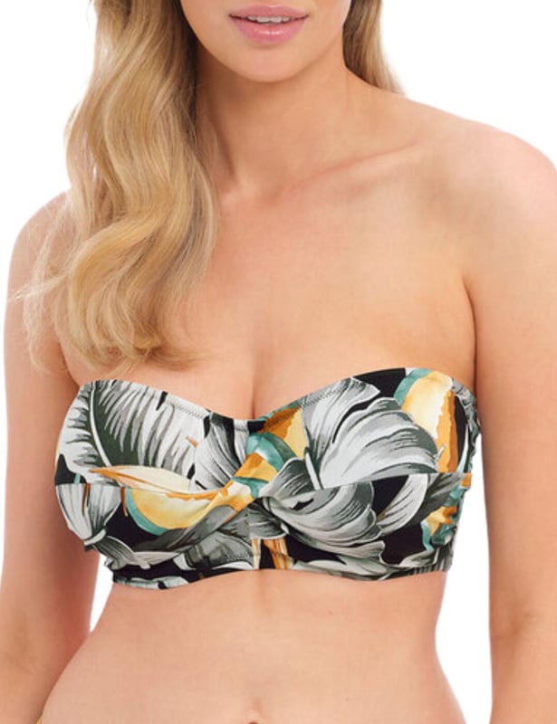Add a splash of style to your summer poolside looks with the Fantasie Bamboo Grove bandeau bikini top. Boasting an eye-catching botanical print and a sweetheart neckline, this on-trend look will help you feel confident and stylish all season long. The concealed underwiring, lightly padded foam cups, and Powernet lining provide that extra support needed while its detachable scarf tie strap provides extra security while adding something special to your swimwear collection. The clip fastening ensures the utmost reliable fit. With many items available for a matching set for an enviable head-to-toe look, the Bamboo Grove bandeau bikini top is sure to turn heads this season!  Bandeau bikini top, Botanical print Twist front, Sweetheart neckline, Concealed underwiring, Lightly padded foam cups, Powernet lined for extra support, Detachable scarf tie strap, Clip fastening for a secure fit, Matching swimwear available, Country of origin: Tunisia, Composition: 83% Polyamide | 17% Elastane, Listed in UK sizes.   Bandeau Bikini Top